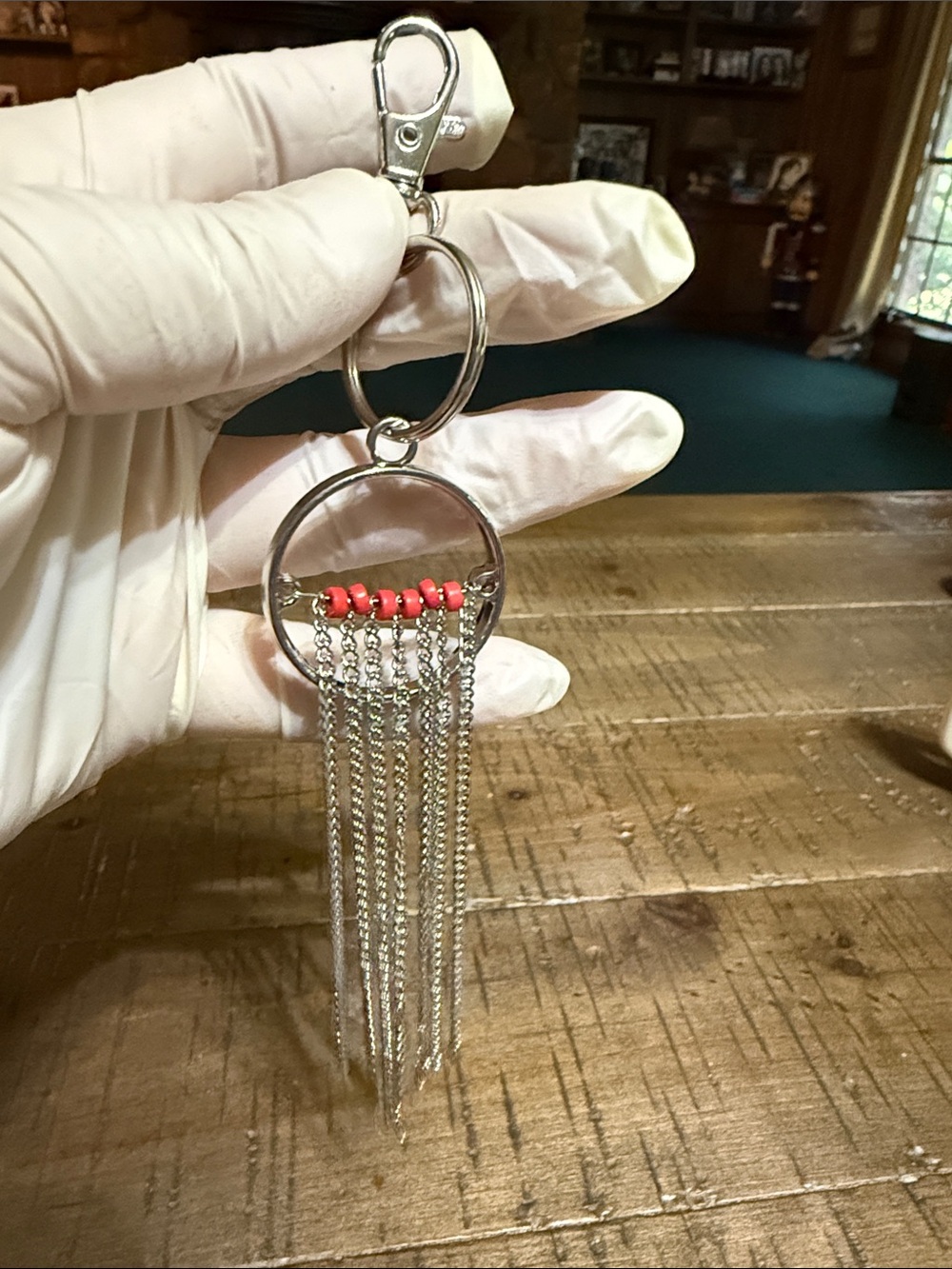 Silver Fringe Keychain with Red Bead Accent